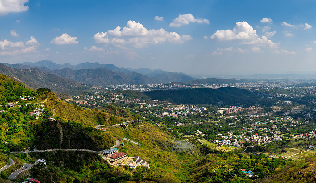 Aerial view of Dehradun city nestled among the Himalayan foothills and lush green valleys