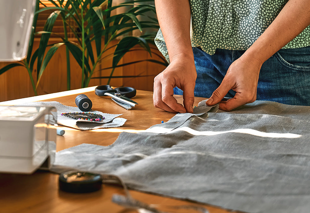 Close-up of linen fabric during the handmade dressmaking process