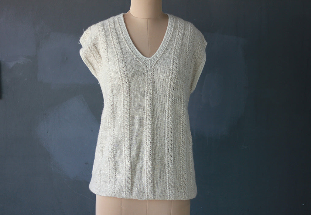 White hand-knitted pashmina sweater