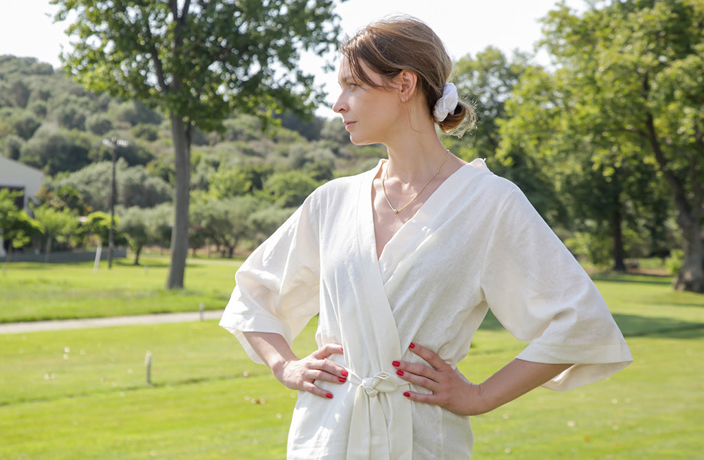 Elegant summer look with white linen kimono-style dress