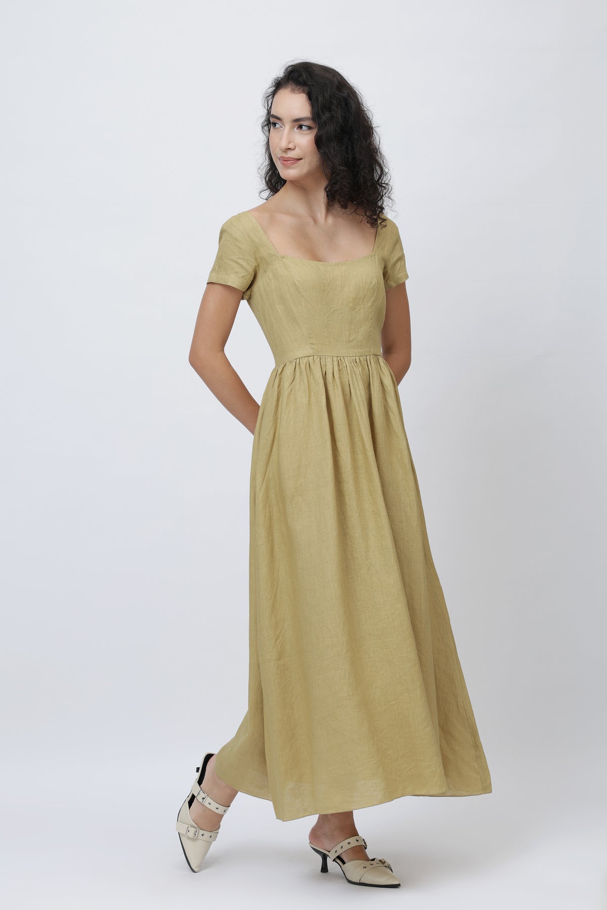 Woman in a long linen maxi skirt dress