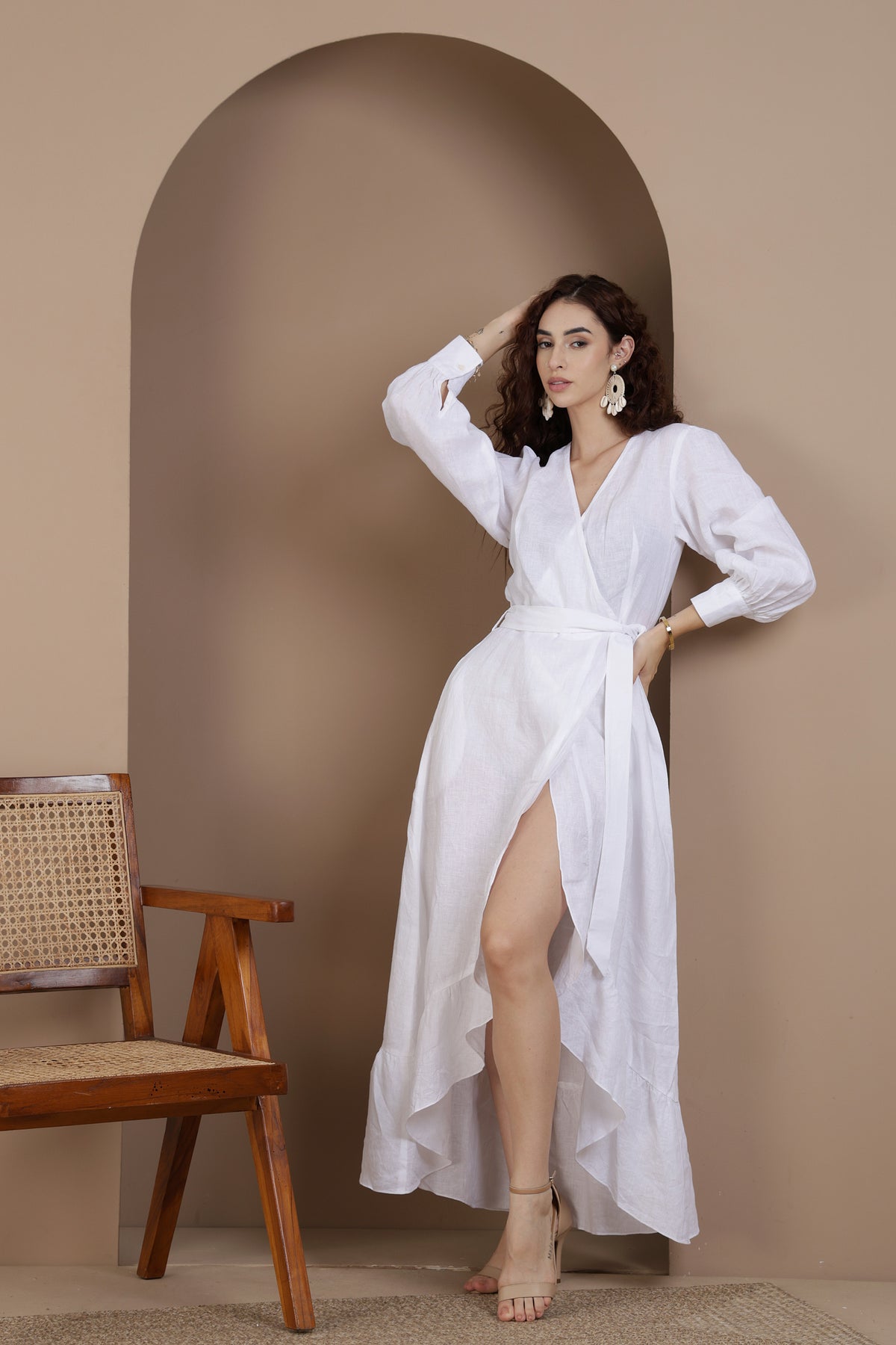 Attractive woman in a linen wrap dress