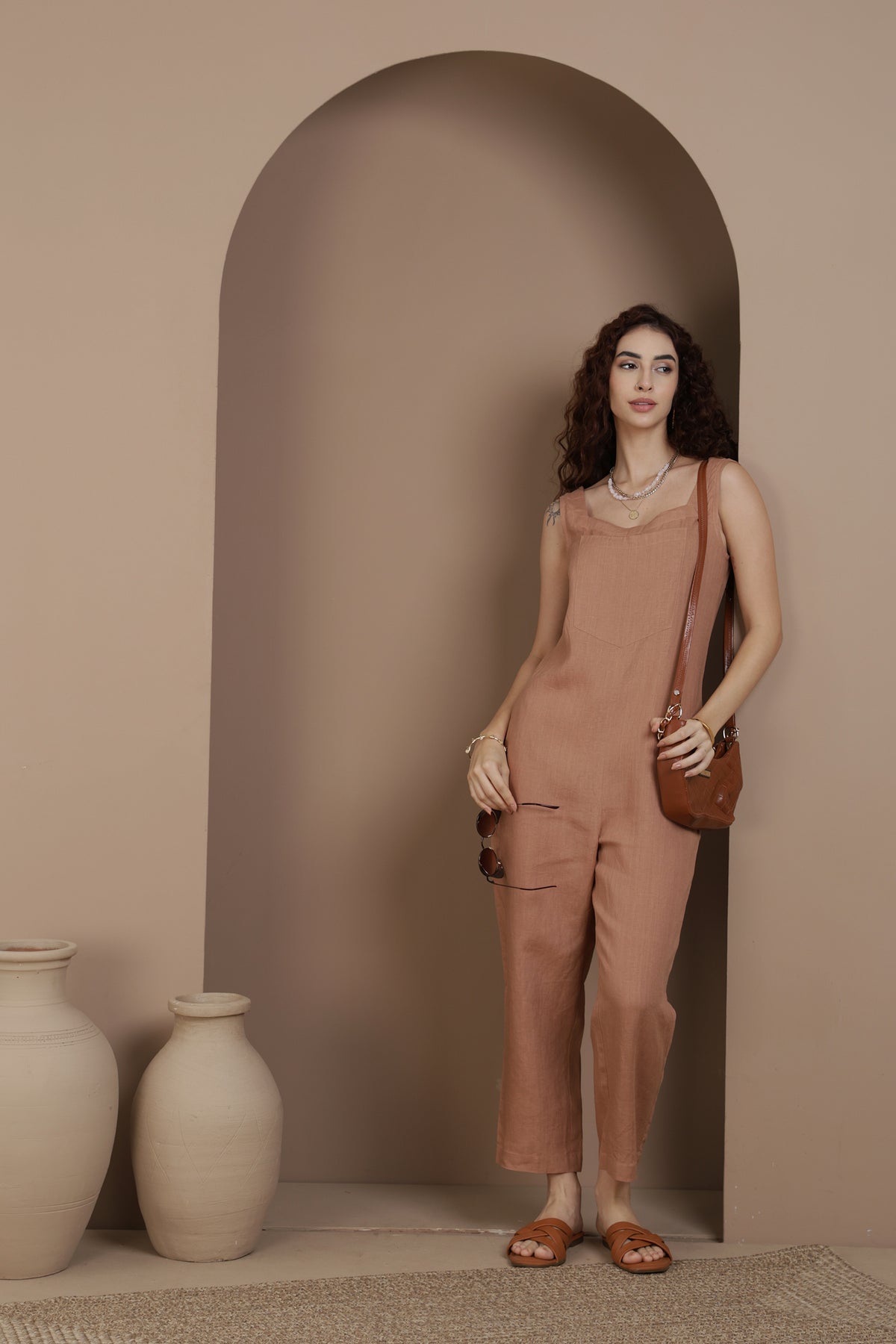 Woman in a brown LINEN jumpsuit 