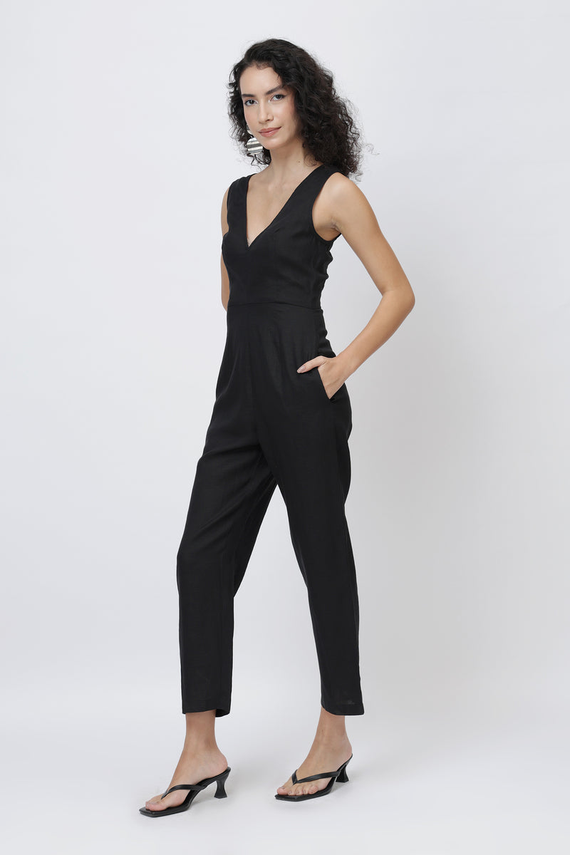 Woman wearing a black jumpsuit