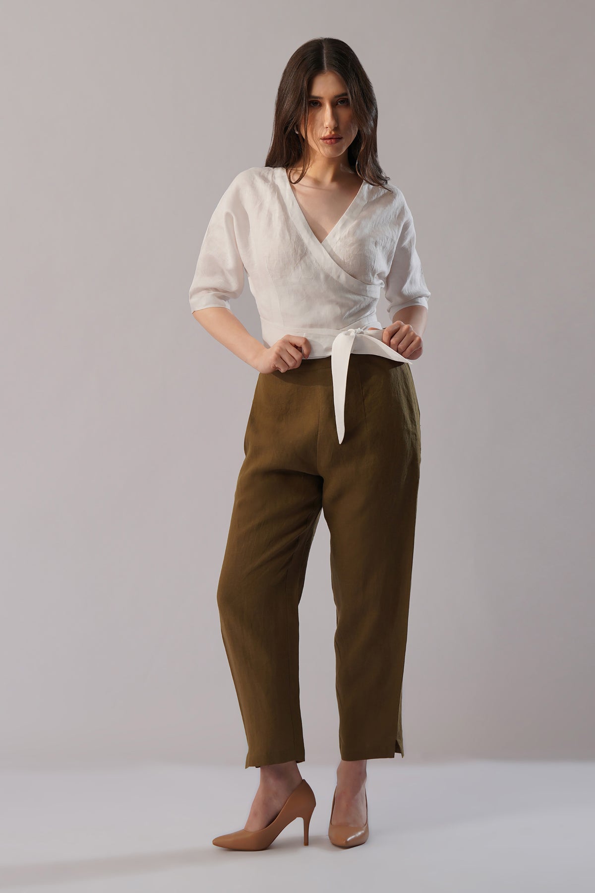 young lady wearing European Linen wrap top with tie waist detail