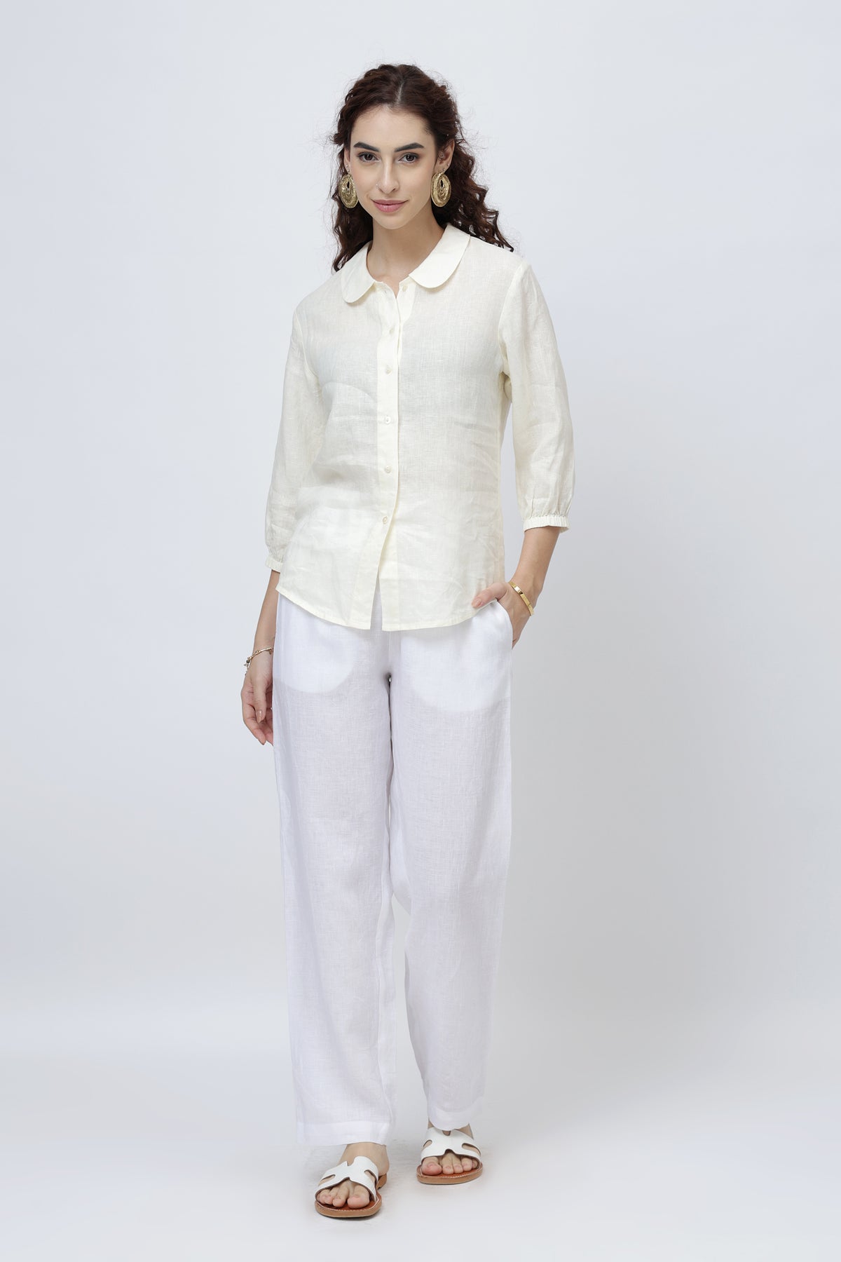 Woman wearing linen shirt and pants