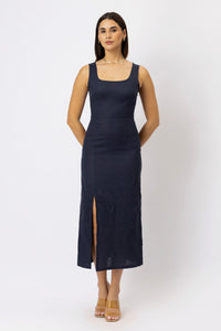 European linen midi dress with square neckline, fitted waist, side slit, and sleeveless design