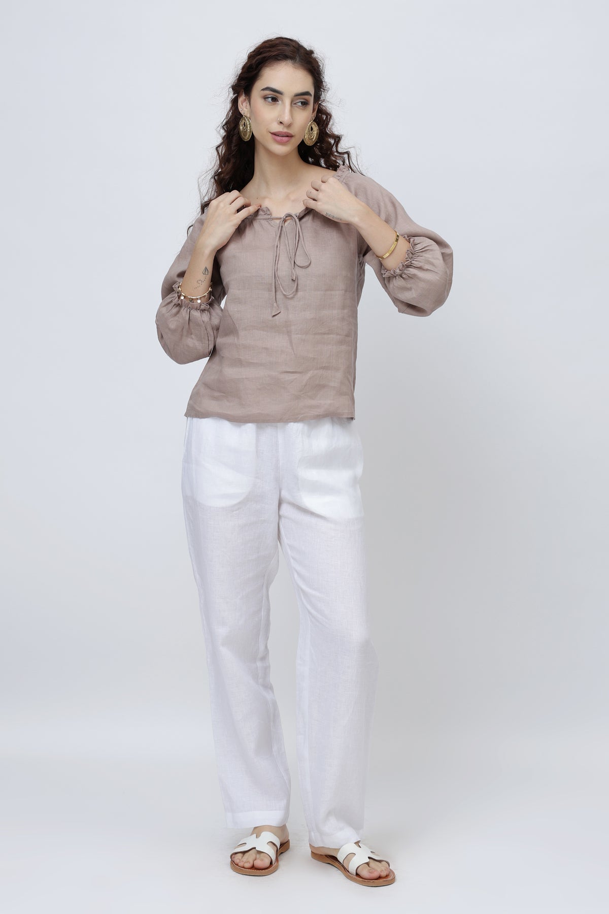 Women’s linen tie-neck top with soft ruffle collar in premium European linen front view
