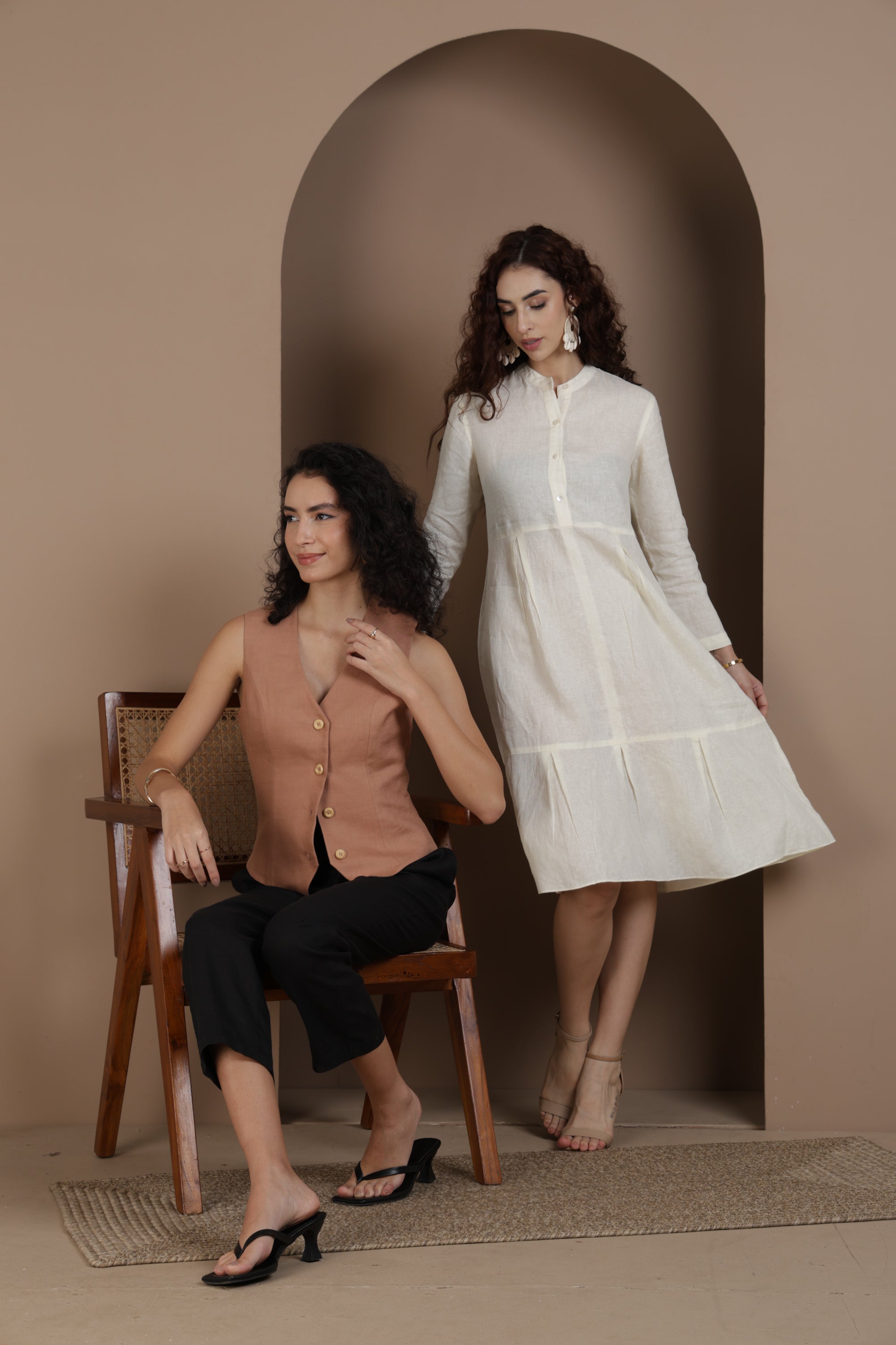 Brown linen vest with black cropped pants and white linen midi dress for women
