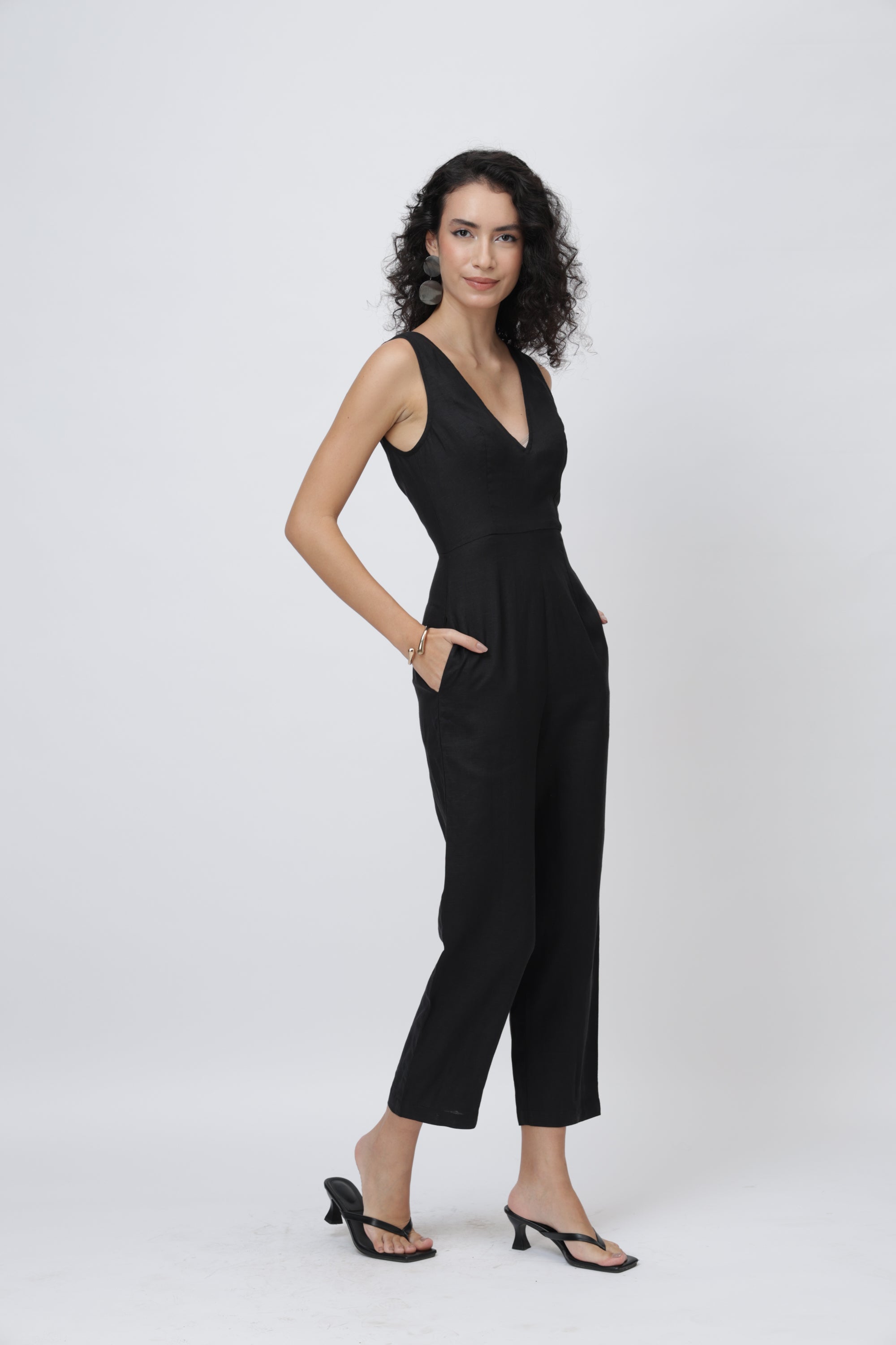 Black sleeveless V-neck linen jumpsuit for women with wide-leg fit