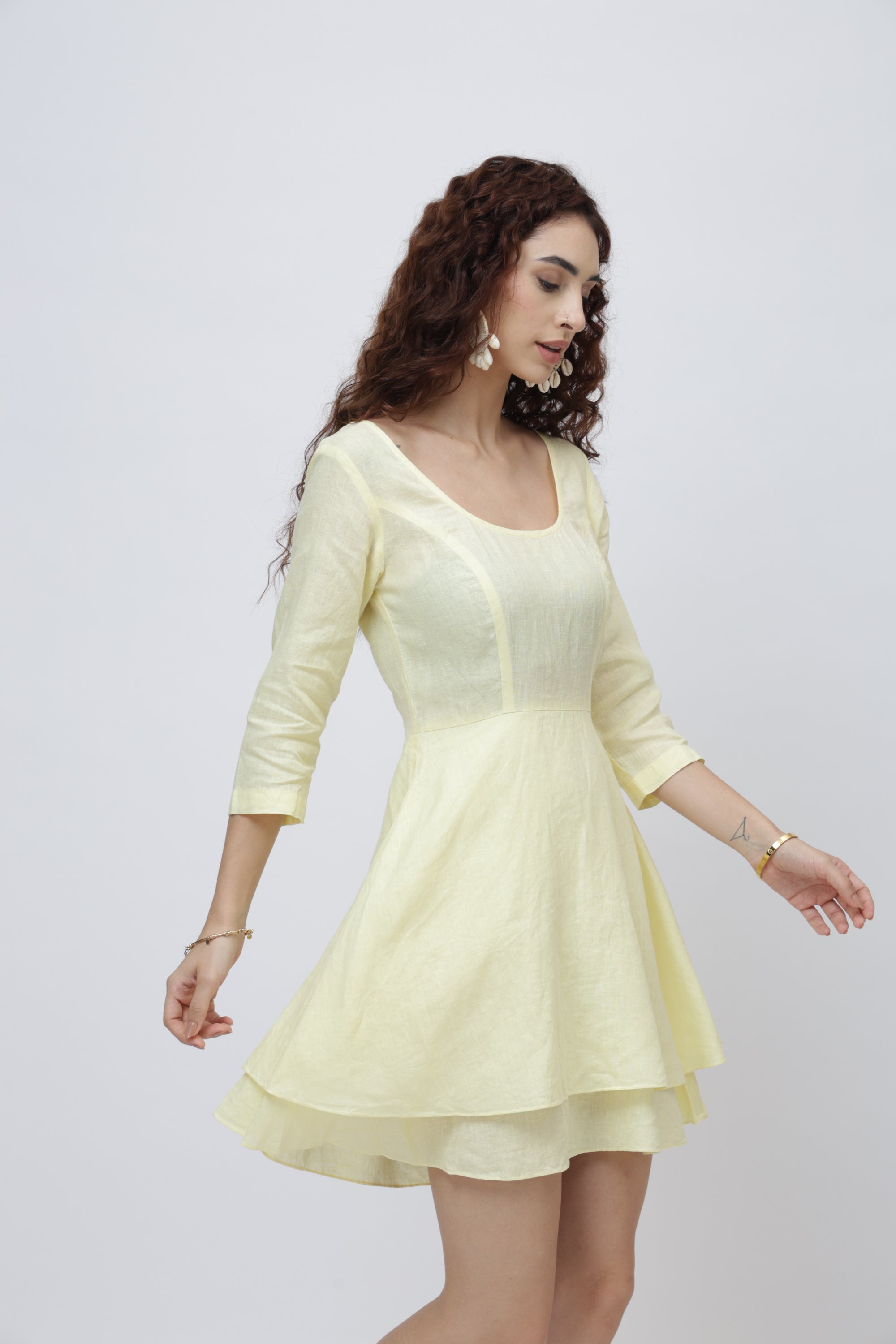 Light yellow linen mini dress for women with scoop neckline and three-quarter sleeves