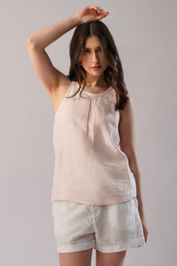 Blush linen sleeveless top with high neckline front view