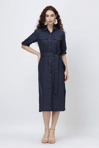 Woman wearing European linen shirt dress with a belt