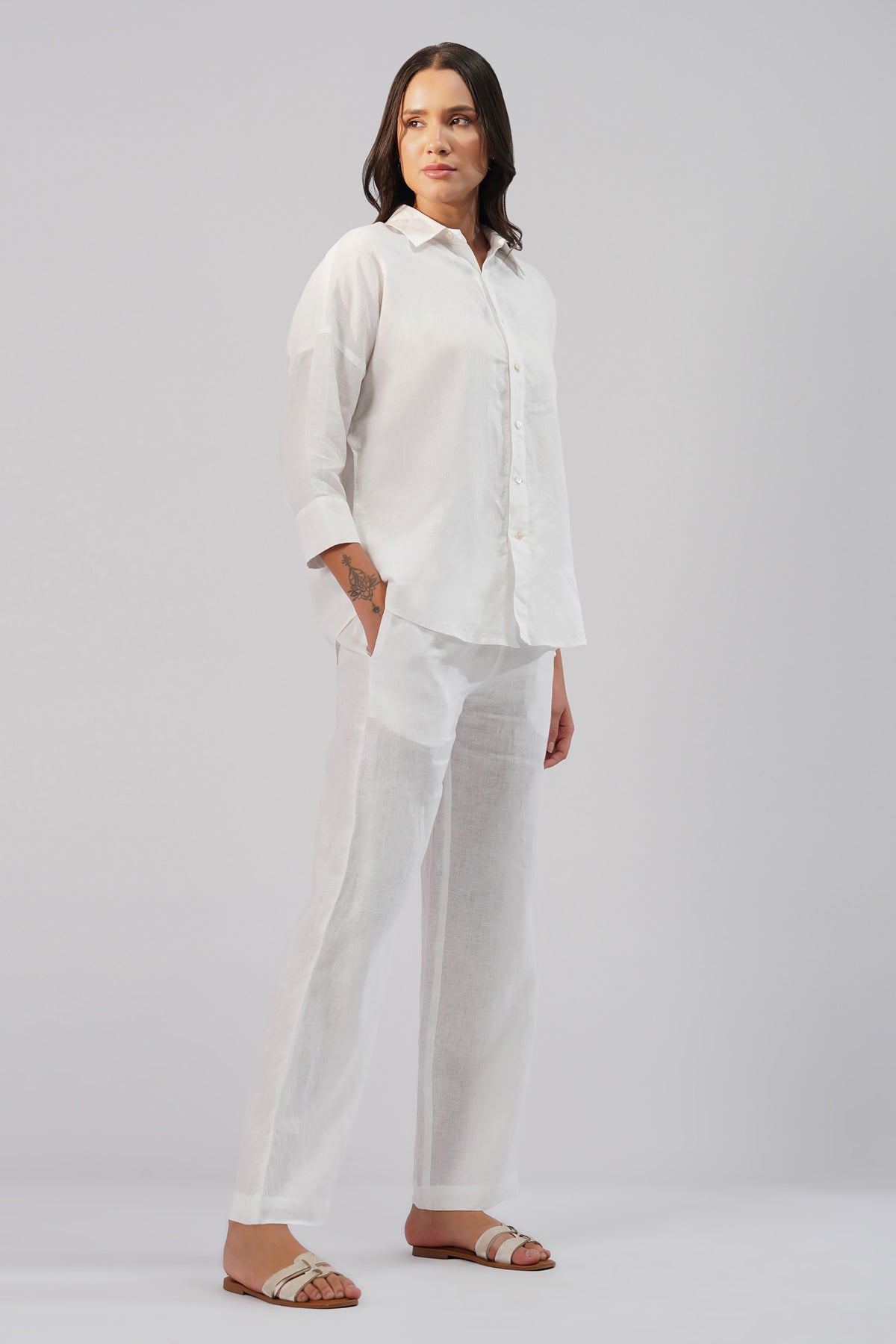 White linen shirt styled with linen pants