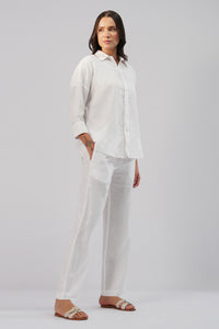 White linen shirt styled with linen pants