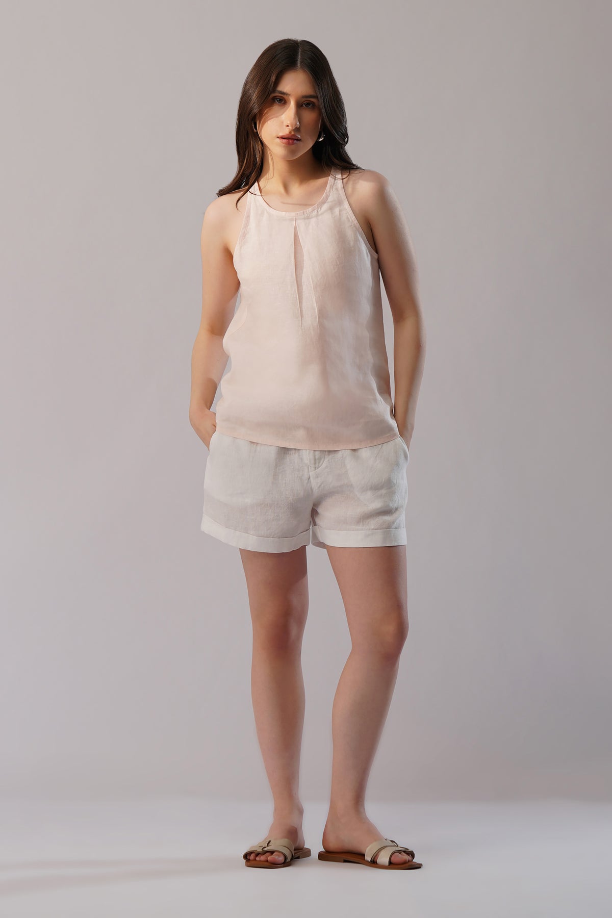 young attractive lady in smart linen shorts with matching linen top