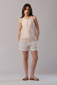 young attractive lady in smart linen shorts with matching linen top