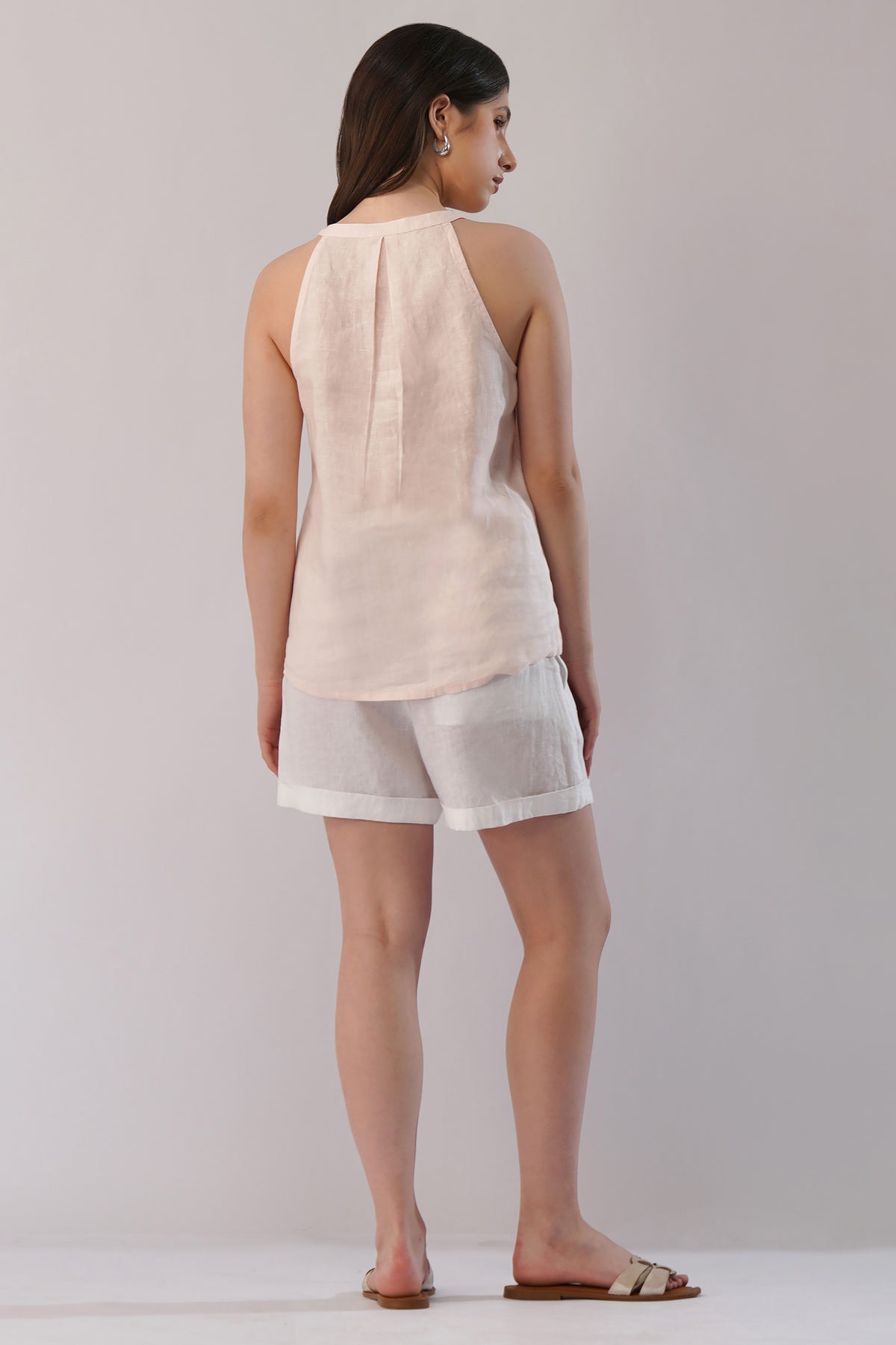 Relaxed fit linen top back view with pleat