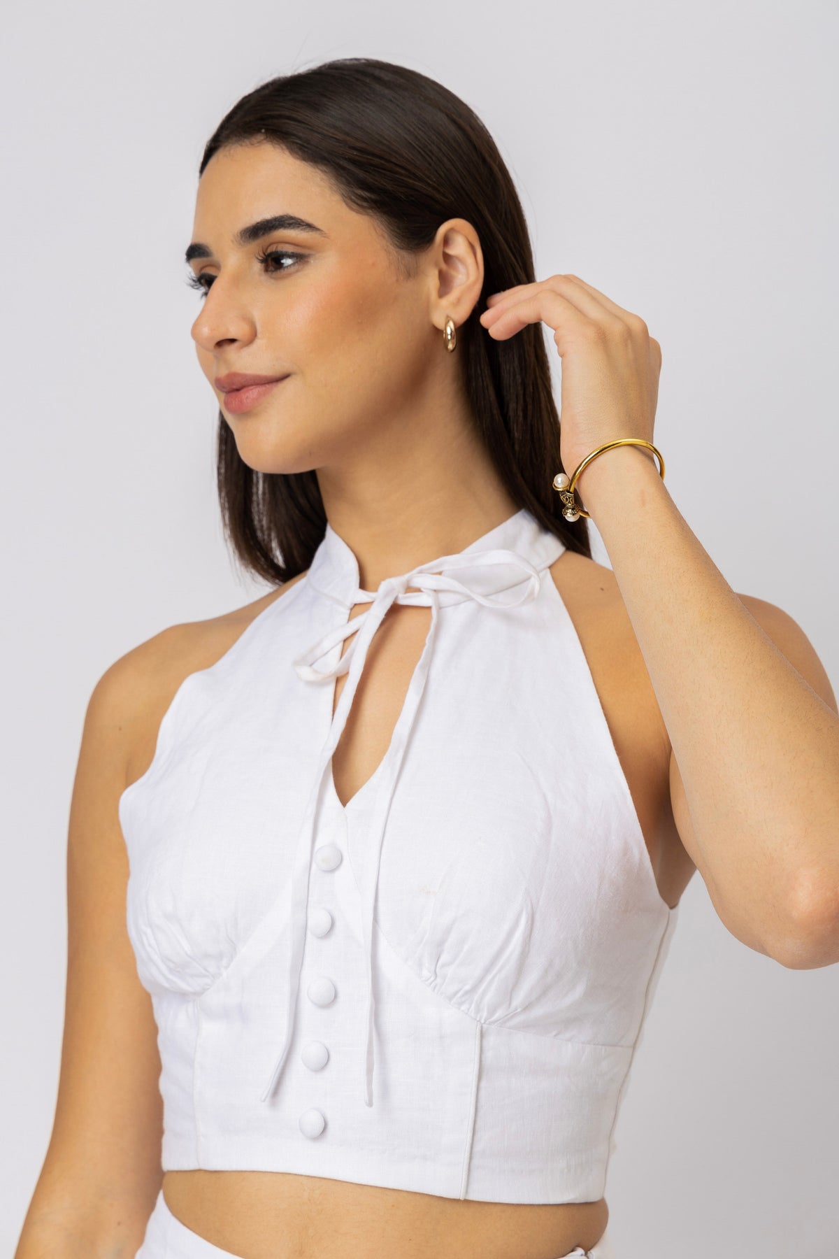 Close-up of halter neckline with adjustable tie detail