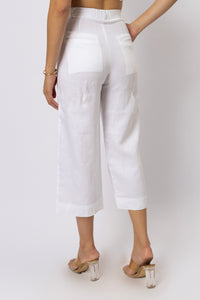 Relaxed straight-leg capri pants shown from the rear three-quarter view