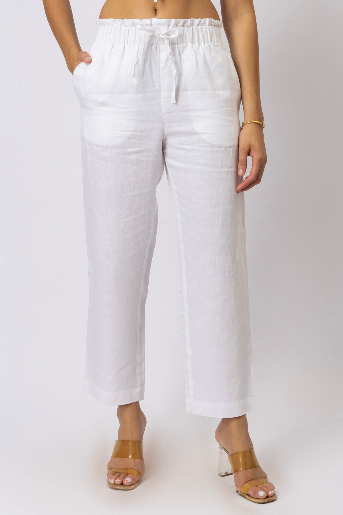 Women's relaxed linen pants with paperbag waist, adjustable drawstring and functional side pockets