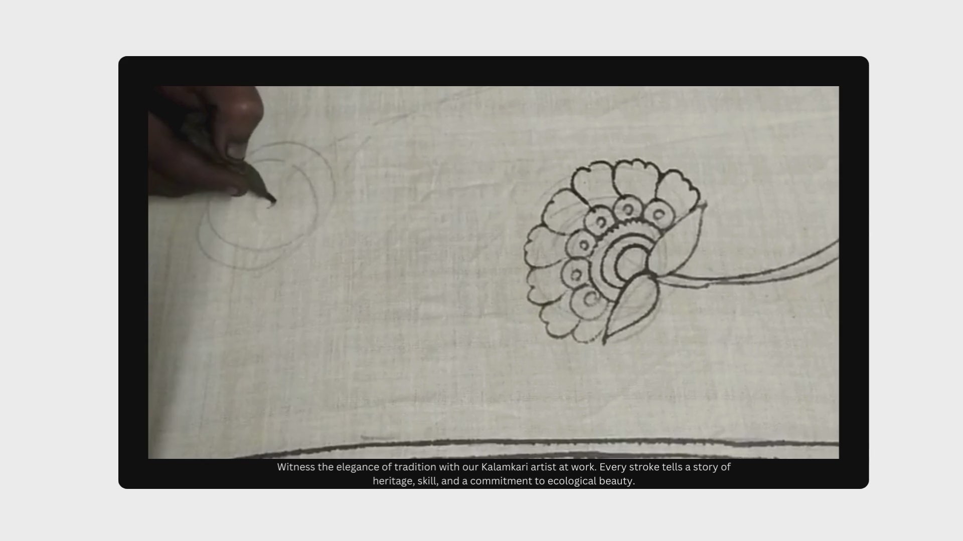 kalamkari artist drawing on fabric from handmade natural colours and kalam (pen)