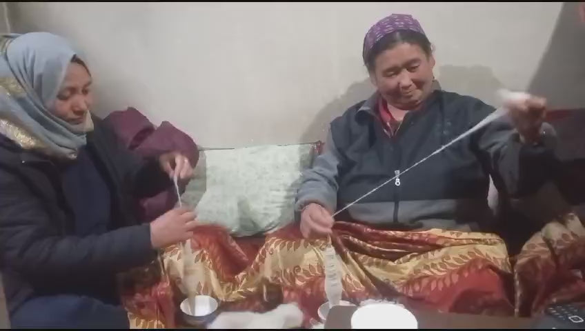 women weavers in Ladakh hand spinning pashmina cashmere wool