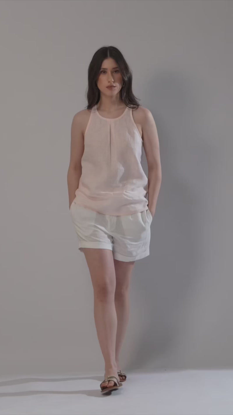 girl wearing linen tank top summers