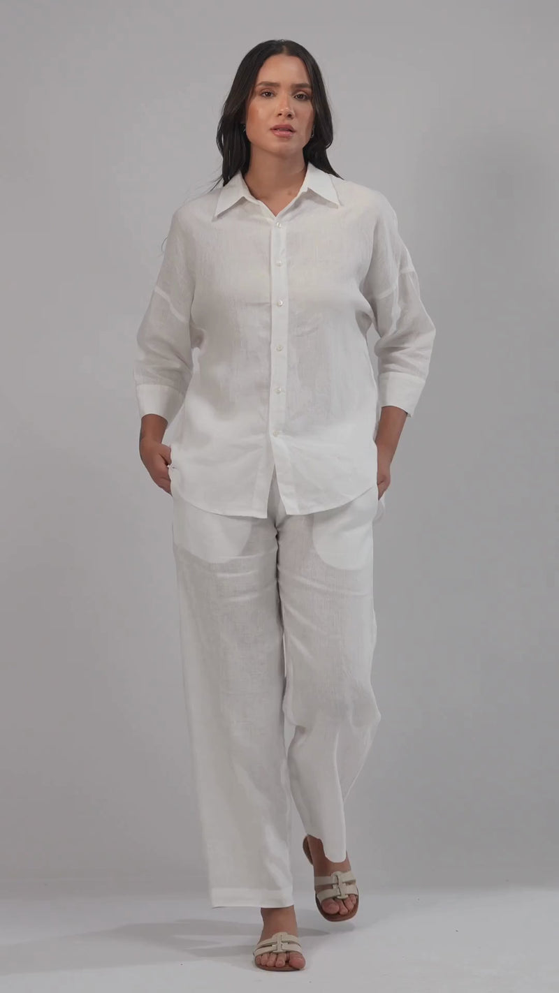 women wearing a relaxed fit linen shirt