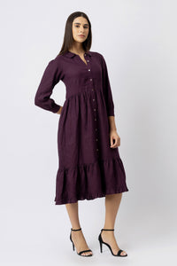 Linen shirt dress with rounded collar, button-front design, gathered waist, and tiered midi skirt