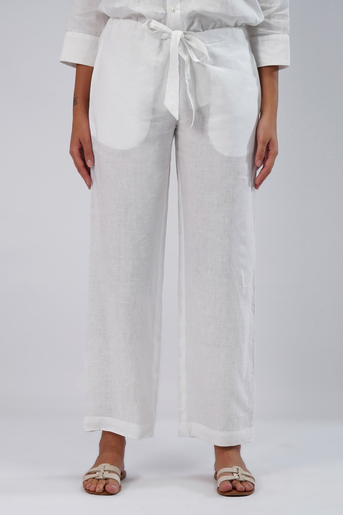 front view white linen pants with tie waist and relaxed fit