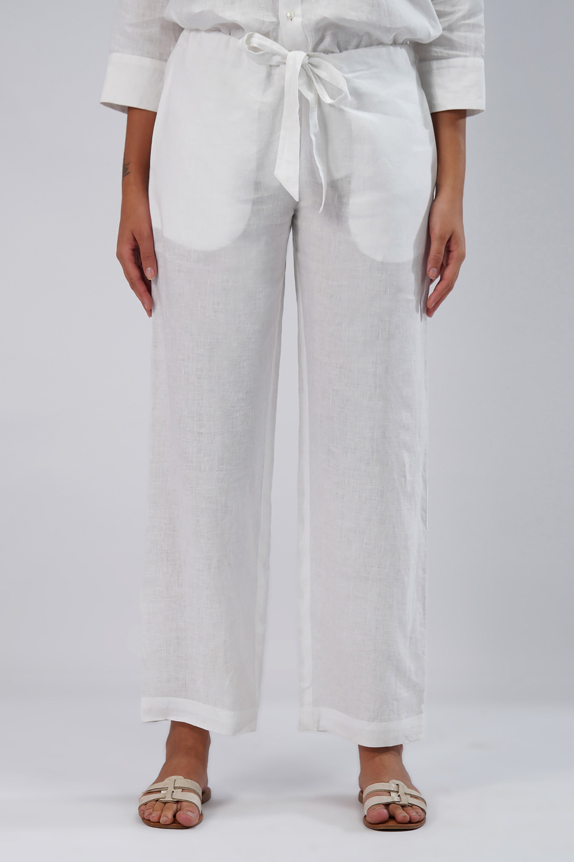 front view white linen pants with tie waist and relaxed fit