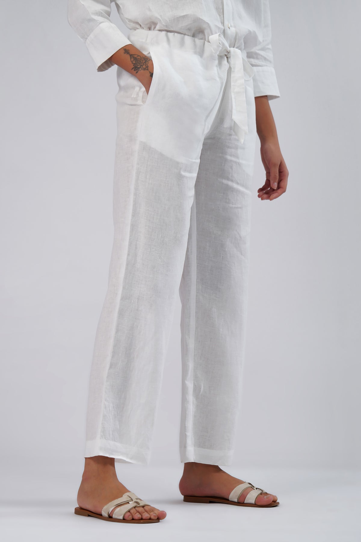 side view white linen pants with pockets lightweight summer trousers