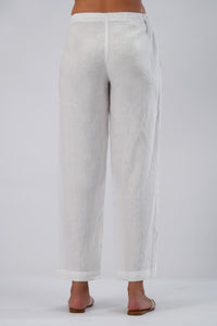 back view of white european linen pants with adjustable tie waist