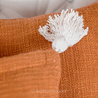 large white corner tassels