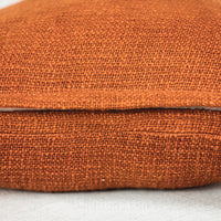 textured handwoven cotton cushion cover with tassels