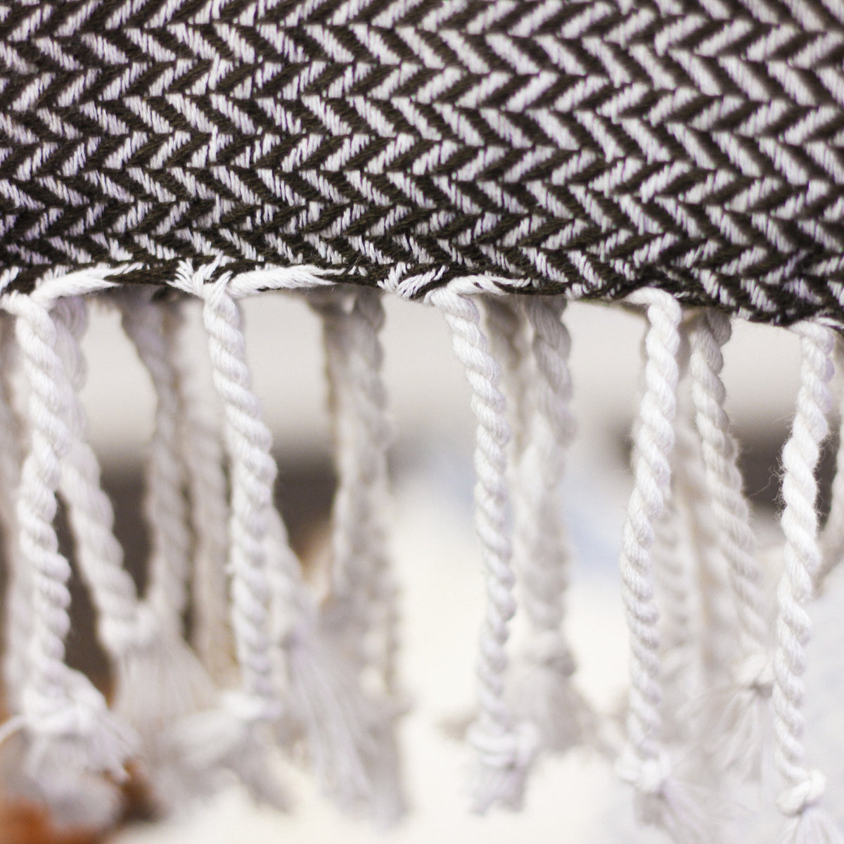 handwoven cotton beach towel with long tassels