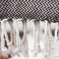 handwoven cotton beach towel with long tassels