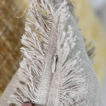zipper hidden under fringes